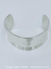 MaxSold Auction: Authentic Tiffany & Co. 1837 Wide Cuff Bracelet 71.75G - Maxsold Signature - Discover collectibles, antiques, fine art and more