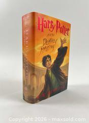 MaxSold Auction: J.K Rowling Harry Potter And The Deathly Hollows First Edition 2007 - Maxsold Signature - Discover collectibles, antiques, fine art and more
