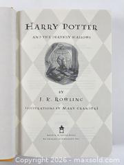 MaxSold Auction: J.K Rowling Harry Potter And The Deathly Hollows First Edition 2007 - Maxsold Signature - Discover collectibles, antiques, fine art and more