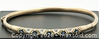 MaxSold Auction: Sapphire And Diamond Hinged Gold Bangle - Maxsold Signature - Discover collectibles, antiques, fine art and more