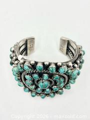 MaxSold Auction: Sterling Silver Navajo Turquoise Cluster Cuff Bracelet By Cecil Sanders 196G - Maxsold Signature - Discover collectibles, antiques, fine art and more
