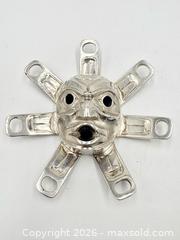 MaxSold Auction: Sun Mask Pendant Pacific Northwest Indigenous Massive 160.25G - Maxsold Signature - Discover collectibles, antiques, fine art and more