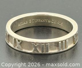 MaxSold Auction: Tiffany & Co. Atlas Narrow Band In 925 Sterling Silver ?Size 7.5 - Maxsold Signature - Discover collectibles, antiques, fine art and more