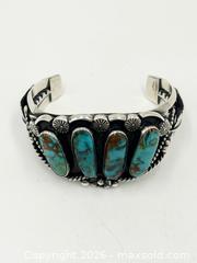 MaxSold Auction: Vintage Navajo Turquoise Row Cuff Bracelet Handcrafted By Artist Rj Candé 91G - Maxsold Signature - Discover collectibles, antiques, fine art and more
