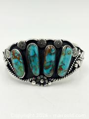 MaxSold Auction: Vintage Navajo Turquoise Row Cuff Bracelet Handcrafted By Artist Rj Candé 91G - Maxsold Signature - Discover collectibles, antiques, fine art and more