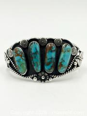 MaxSold Auction: Vintage Navajo Turquoise Row Cuff Bracelet Handcrafted By Artist Rj Candé 91G - Maxsold Signature - Discover collectibles, antiques, fine art and more