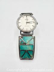 MaxSold Auction: Vintage Omega Seamaster 34Mm Automatic With Navajo Sterling Silver Turquoise Inlay Band Tips - Maxsold Signature - Discover collectibles, antiques, fine art and more