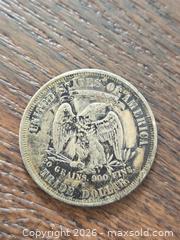 MaxSold Auction: 1877 United States Trade Dollar (.900 Silver) - Los Angeles (California, USA) PARTNER MANAGED Moving Online Auction - West 36th Street (CONDO)