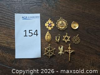 MaxSold Auction: Lot of 10 14K Yellow Gold Pendant / Charm Assorted Themes - Los Angeles (California, USA) PARTNER MANAGED Moving Online Auction - West 36th Street (CONDO)