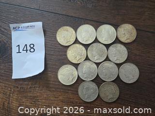 MaxSold Auction: Lot of 13 Peace Silver Dollars (1922–1935) 90% Silver - Los Angeles (California, USA) PARTNER MANAGED Moving Online Auction - West 36th Street (CONDO)