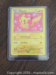 MaxSold Auction: Lot of 7 Pokémon Cards (English & Japanese) with Toploaders - Los Angeles (California, USA) PARTNER MANAGED Moving Online Auction - West 36th Street (CONDO)