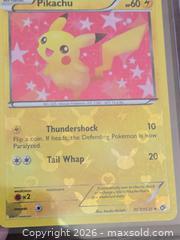 MaxSold Auction: Lot of 7 Pokémon Cards (English & Japanese) with Toploaders - Los Angeles (California, USA) PARTNER MANAGED Moving Online Auction - West 36th Street (CONDO)