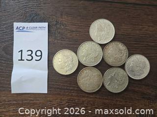 MaxSold Auction: Lot of 7 Silver Morgan Dollar Coins - Los Angeles (California, USA) PARTNER MANAGED Moving Online Auction - West 36th Street (CONDO)