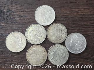 MaxSold Auction: Lot of 7 Silver Morgan Dollar Coins - Los Angeles (California, USA) PARTNER MANAGED Moving Online Auction - West 36th Street (CONDO)