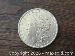 MaxSold Auction: Lot of 7 Silver Morgan Dollar Coins - Los Angeles (California, USA) PARTNER MANAGED Moving Online Auction - West 36th Street (CONDO)