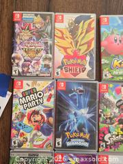 MaxSold Auction:  Mixed Video Games for Nintendo Switch and cases & PSP / UMD - Los Angeles (California, USA) PARTNER MANAGED Moving Online Auction - West 36th Street (CONDO)