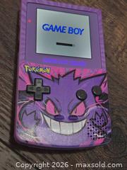 MaxSold Auction: Nintendo Game Boy Color (CGB-001) — Pokemon Gengar Shell - Los Angeles (California, USA) PARTNER MANAGED Moving Online Auction - West 36th Street (CONDO)