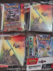 MaxSold Auction: Pokémon Scarlet & Violet Obsidian Flames Mini Portfolio w/ Booster - Los Angeles (California, USA) PARTNER MANAGED Moving Online Auction - West 36th Street (CONDO)