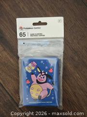 MaxSold Auction: Pokémon TCG Lot: 15 Sealed Promos & Card Sleeves - Los Angeles (California, USA) PARTNER MANAGED Moving Online Auction - West 36th Street (CONDO)