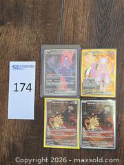 MaxSold Auction: Pokémon TCG Team Rocket's Mewtwo ex & Meowth Lot (4 cards) - Los Angeles (California, USA) PARTNER MANAGED Moving Online Auction - West 36th Street (CONDO)