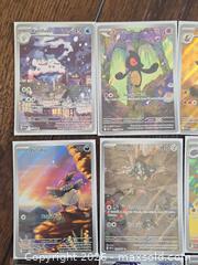 MaxSold Auction: Pokémon Trading Card Lot — 12 Holo/Full Art Cards - Los Angeles (California, USA) PARTNER MANAGED Moving Online Auction - West 36th Street (CONDO)
