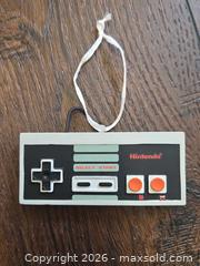 MaxSold Auction: Video Game Ornament Lot: Nintendo NES & Sega Dreamcast Figures - Los Angeles (California, USA) PARTNER MANAGED Moving Online Auction - West 36th Street (CONDO)