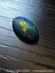 MaxSold Auction: AAA full fire Ethiopian black opal - Toronto (Ontario, Canada) PARTNER MANAGED Reseller Online Auction - Gerrard Street East