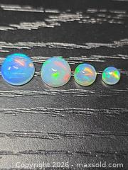 MaxSold Auction: Beautiful natural opal collection  - Toronto (Ontario, Canada) PARTNER MANAGED Reseller Online Auction - Gerrard Street East