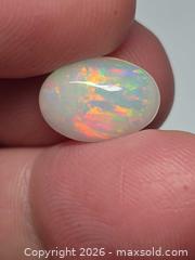 MaxSold Auction: Gorgeous investment grade Ethiopian opal  - Toronto (Ontario, Canada) PARTNER MANAGED Reseller Online Auction - Gerrard Street East