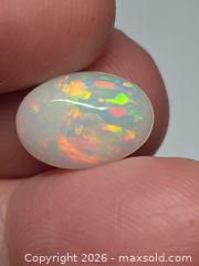 MaxSold Auction: Gorgeous investment grade Ethiopian opal  - Toronto (Ontario, Canada) PARTNER MANAGED Reseller Online Auction - Gerrard Street East