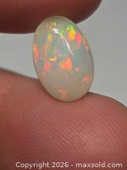 MaxSold Auction: Gorgeous investment grade Ethiopian opal  - Toronto (Ontario, Canada) PARTNER MANAGED Reseller Online Auction - Gerrard Street East
