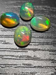 MaxSold Auction: Incredible!! Quality Ethiopian opal collection  - Toronto (Ontario, Canada) PARTNER MANAGED Reseller Online Auction - Gerrard Street East