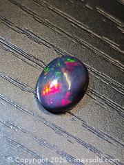 MaxSold Auction: Intense black opal - Toronto (Ontario, Canada) PARTNER MANAGED Reseller Online Auction - Gerrard Street East