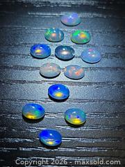 MaxSold Auction: Natural AAA Calibrated Jelly opal  - Toronto (Ontario, Canada) PARTNER MANAGED Reseller Online Auction - Gerrard Street East