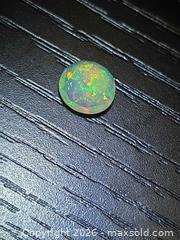 MaxSold Auction: Natural AAA rare faceted cut Opal  - Toronto (Ontario, Canada) PARTNER MANAGED Reseller Online Auction - Gerrard Street East