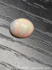 MaxSold Auction: Natural Ethiopian fire opal - Toronto (Ontario, Canada) PARTNER MANAGED Reseller Online Auction - Gerrard Street East