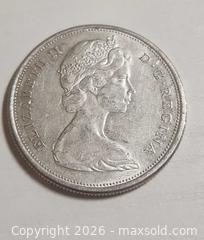 MaxSold Auction: 1965 Canadian 50-cent coin .800 SILVER Queen Elizabeth II 11.71 grams - Mississauga (Ontario, Canada) SELLER MANAGED Downsizing Online Auction - Golden Orchard Drive (CONDO)