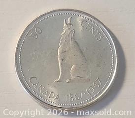 MaxSold Auction: 1967 CANADA Queen ELIZABETH II Wolf Howls Old Silver 50 Cents Coin , 11.82 grams - Mississauga (Ontario, Canada) SELLER MANAGED Downsizing Online Auction - Golden Orchard Drive (CONDO)