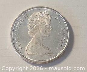 MaxSold Auction: 1967 CANADA Queen ELIZABETH II Wolf Howls Old Silver 50 Cents Coin , 11.82 grams - Mississauga (Ontario, Canada) SELLER MANAGED Downsizing Online Auction - Golden Orchard Drive (CONDO)