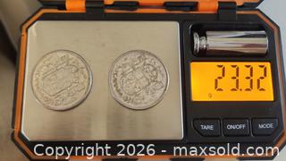 MaxSold Auction: TWO - 1958 Canadian 50-cent coin,  SILVER 23.32 grams in total - Mississauga (Ontario, Canada) SELLER MANAGED Downsizing Online Auction - Golden Orchard Drive (CONDO)