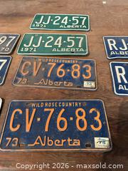 MaxSold Auction: Alberta Metal License Plates 1970-1973 - Lot of 9 - Acme (Alberta, Canada) PARTNER MANAGED Moving Online Auction - Township Road 292