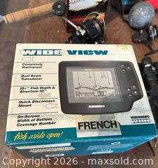 MaxSold Auction: Fishing gear lot with Humminbird fishfinder, reels, rods - Acme (Alberta, Canada) PARTNER MANAGED Moving Online Auction - Township Road 292