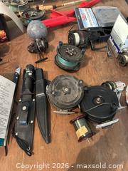 MaxSold Auction: Fishing gear lot with Humminbird fishfinder, reels, rods - Acme (Alberta, Canada) PARTNER MANAGED Moving Online Auction - Township Road 292