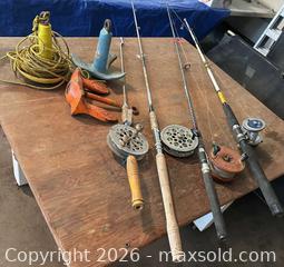 MaxSold Auction: Mixed Fishing Rods with Multiple Reels, Anchors and Line - Acme (Alberta, Canada) PARTNER MANAGED Moving Online Auction - Township Road 292