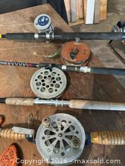 MaxSold Auction: Mixed Fishing Rods with Multiple Reels, Anchors and Line - Acme (Alberta, Canada) PARTNER MANAGED Moving Online Auction - Township Road 292
