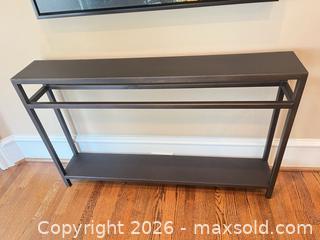 MaxSold Auction: 49 in Black Metal Modern Industrial Console Table - Frisco (Texas, USA) PARTNER MANAGED Downsizing Online Auction - Miramar Drive