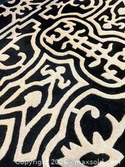 MaxSold Auction: 5' x 8' Black and Ivory Floral Rectangular Wool Area Rug - Frisco (Texas, USA) PARTNER MANAGED Downsizing Online Auction - Miramar Drive