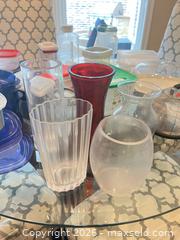 MaxSold Auction: Assorted plastic food storage containers, glass vases and lids - Frisco (Texas, USA) PARTNER MANAGED Downsizing Online Auction - Miramar Drive
