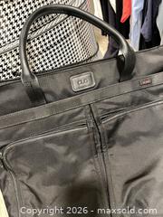 MaxSold Auction: MCM Tote & TUMI Briefcase — Black Leather & Nylon - Frisco (Texas, USA) PARTNER MANAGED Downsizing Online Auction - Miramar Drive