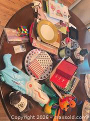 MaxSold Auction: Mixed Party Supplies Assortment — Plates Napkins Gift Bags & Toys - Frisco (Texas, USA) PARTNER MANAGED Downsizing Online Auction - Miramar Drive